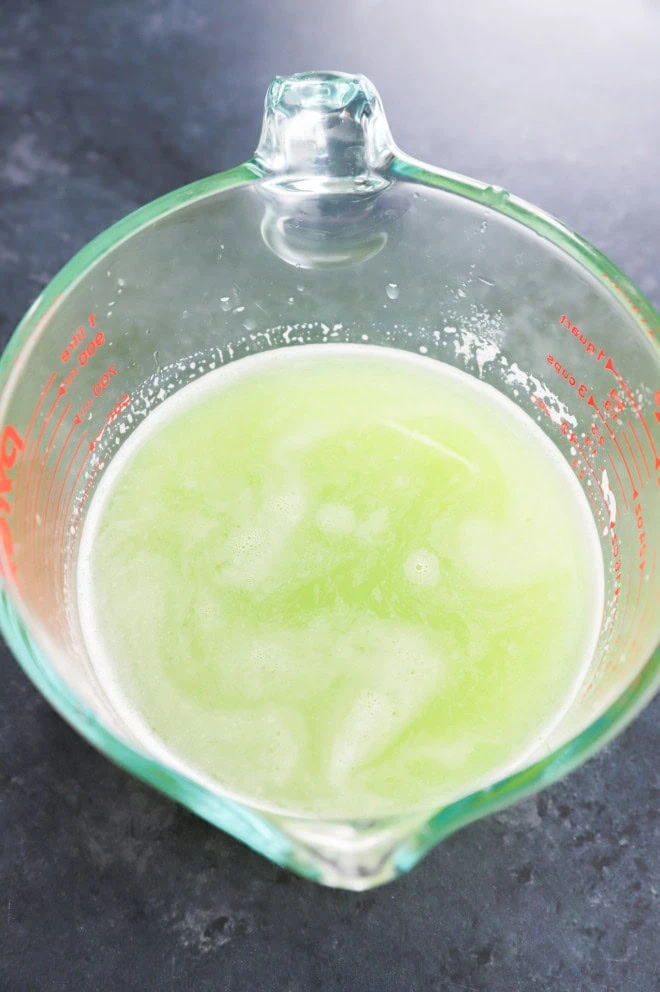 fresh cucumber juice in a pyrex measuring cup