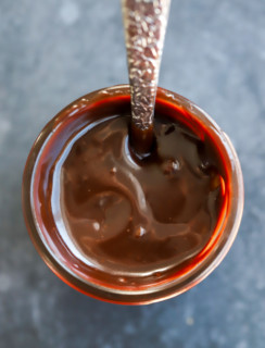 Overhead image of baileys hot fudge sauce in jar