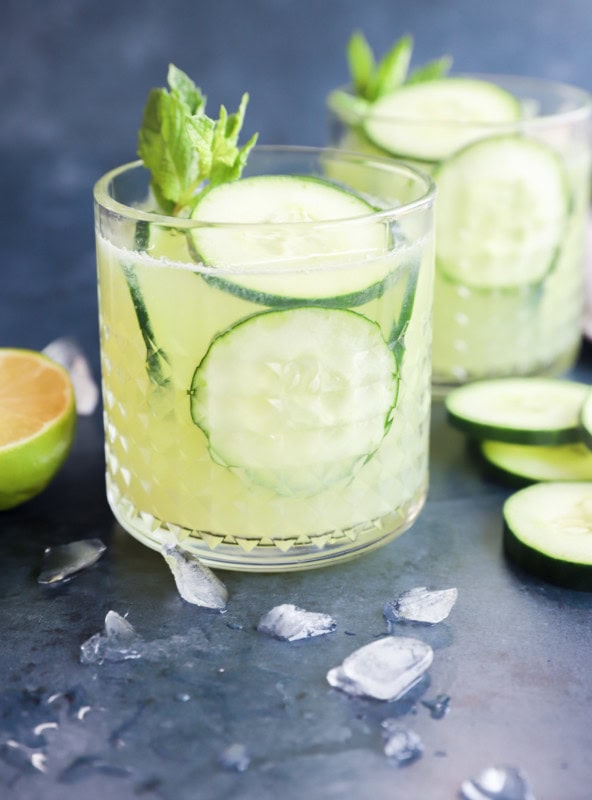 Vegetable tequila cocktail in glasses with mint sprigs