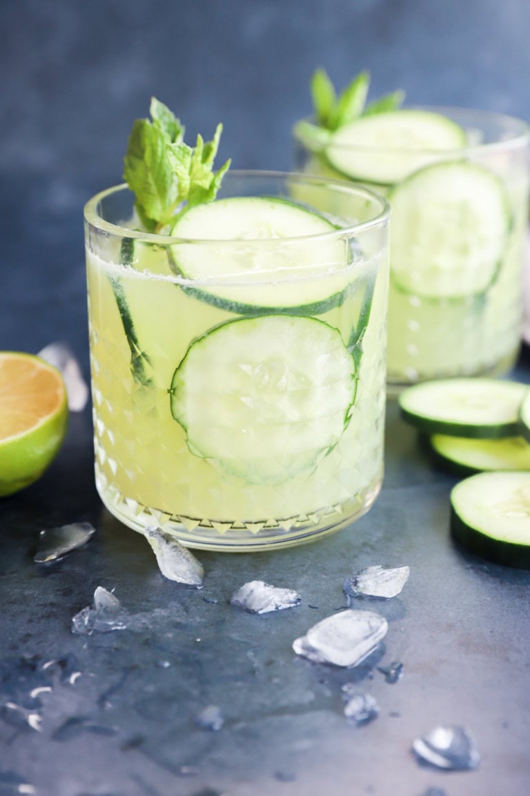 Vegetable tequila cocktail in glasses with mint sprigs