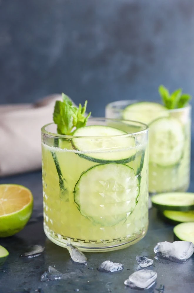 Fresh vegetable cocktails in glasses with fresh lime