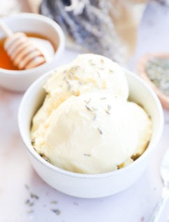 lavender honey ice cream in a bowl