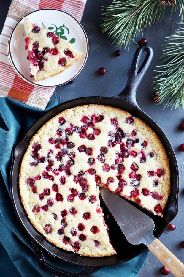 Slice of cobbler in a skillet plate image