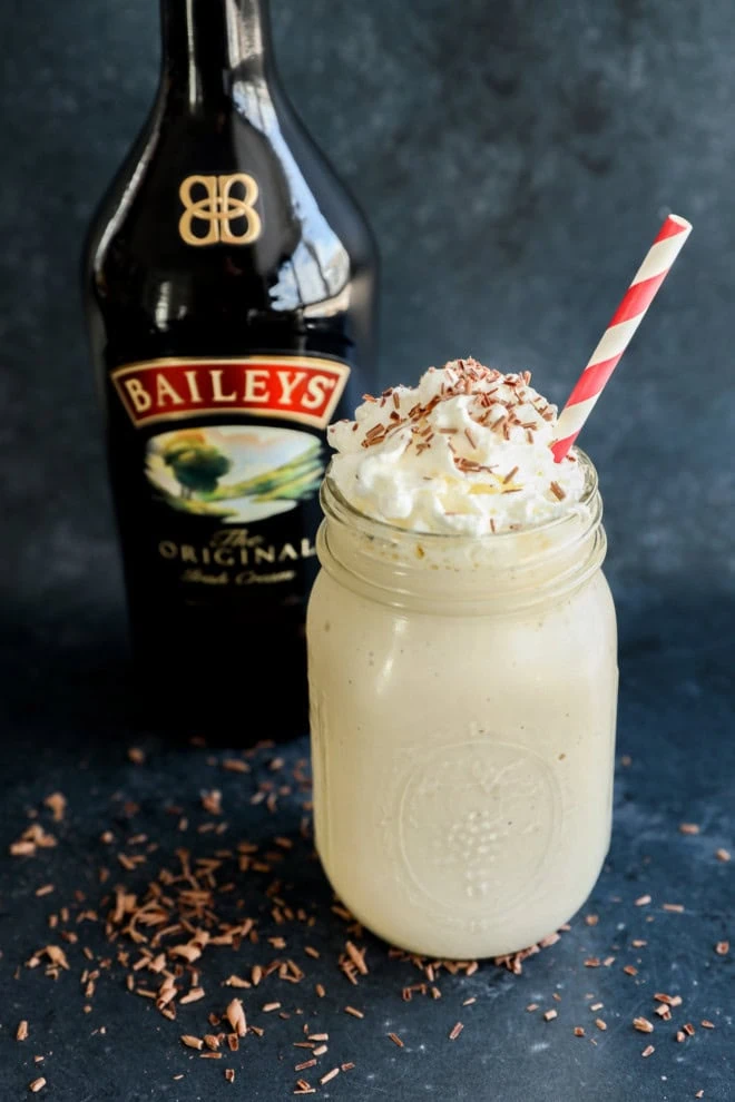 baileys coffee milkshake with baileys bottle in the background