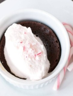 Gooey Dark Chocolate Cakes with Peppermint Crunch Whipped Cream | cakenknife.com