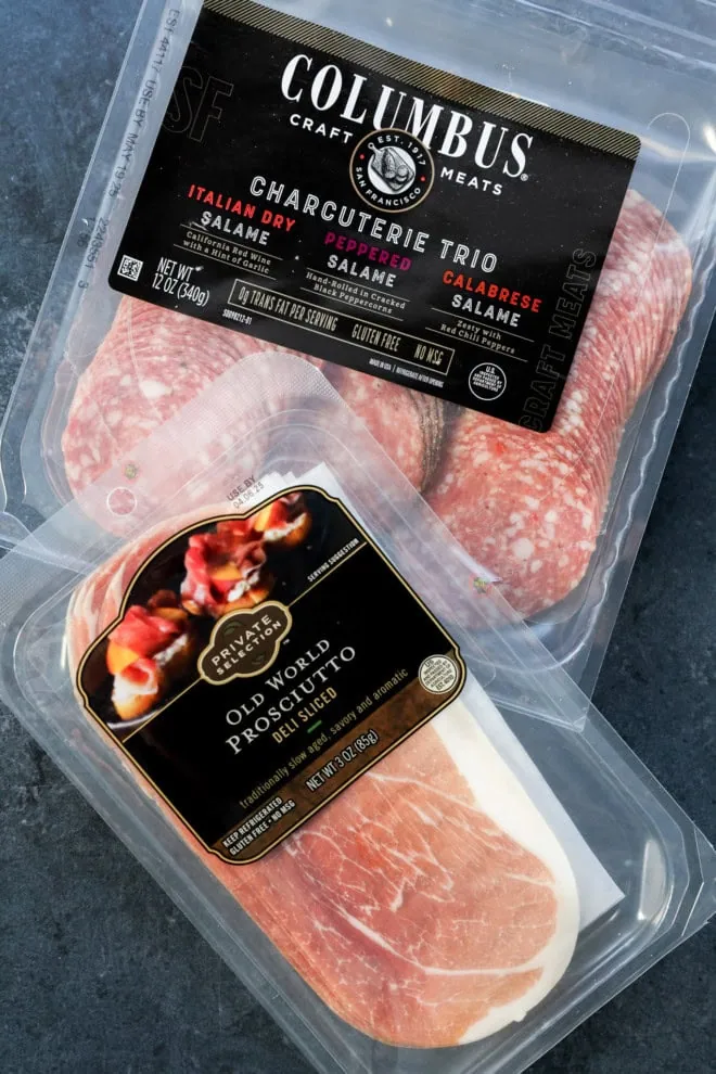 prosciutto and a variety of salami in packages