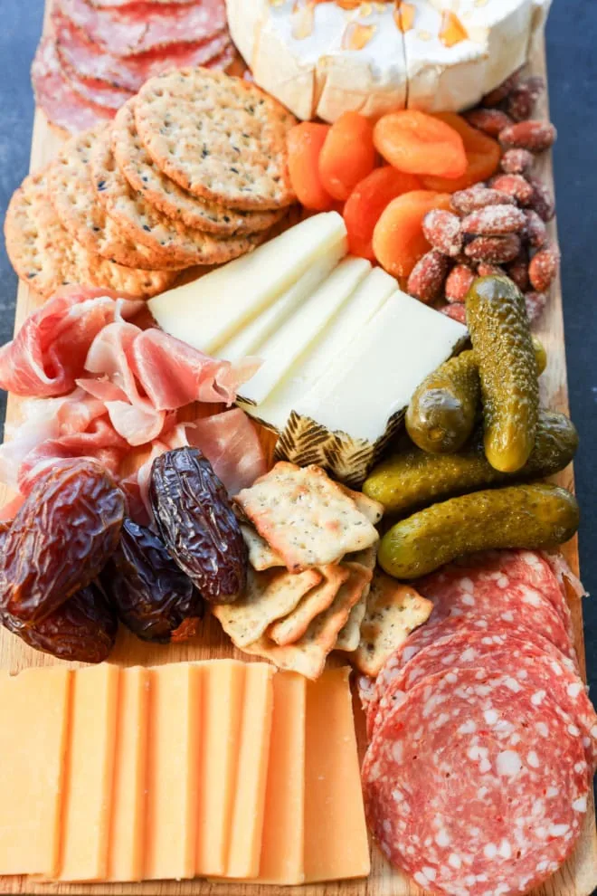 easy charcuterie board with cheese meat and extras