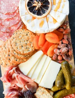 brie with hot honey and other cheeses, meats, and extras