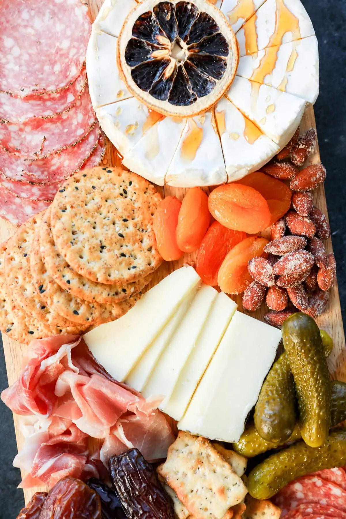 brie with hot honey and other cheeses, meats, and extras