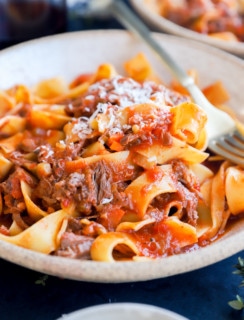 Beef short rib sauce with pasta in a bowl image