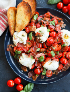 Burrata caprese salad image on platter