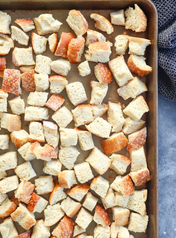 toasted bread cubes on sheet pan