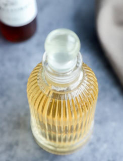 vanilla simple syrup recipe in a syrup dispenser