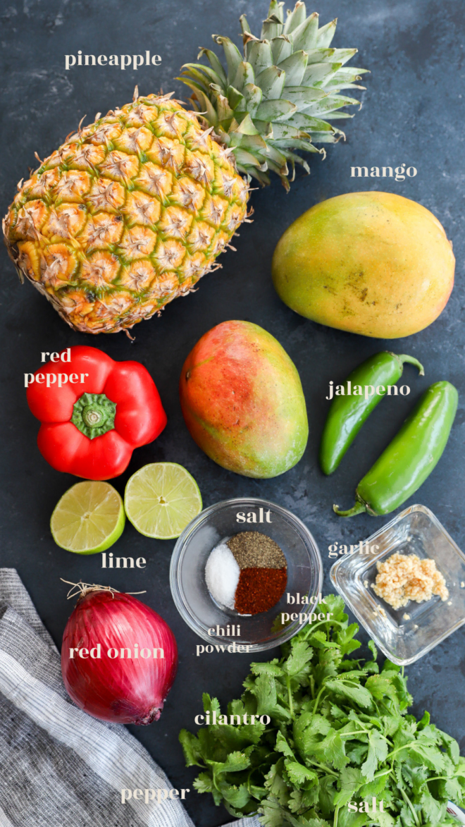 pineapple mango salsa ingredients in bowls with text label