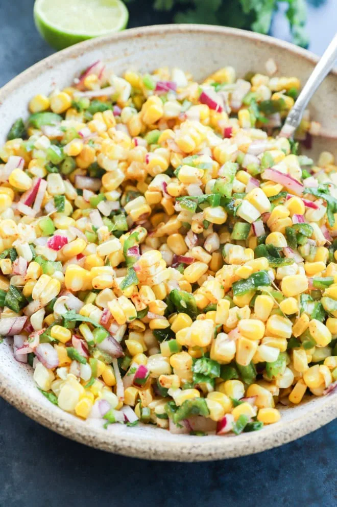 easy appetizer with tons of vegetables in a bowl with a spoon