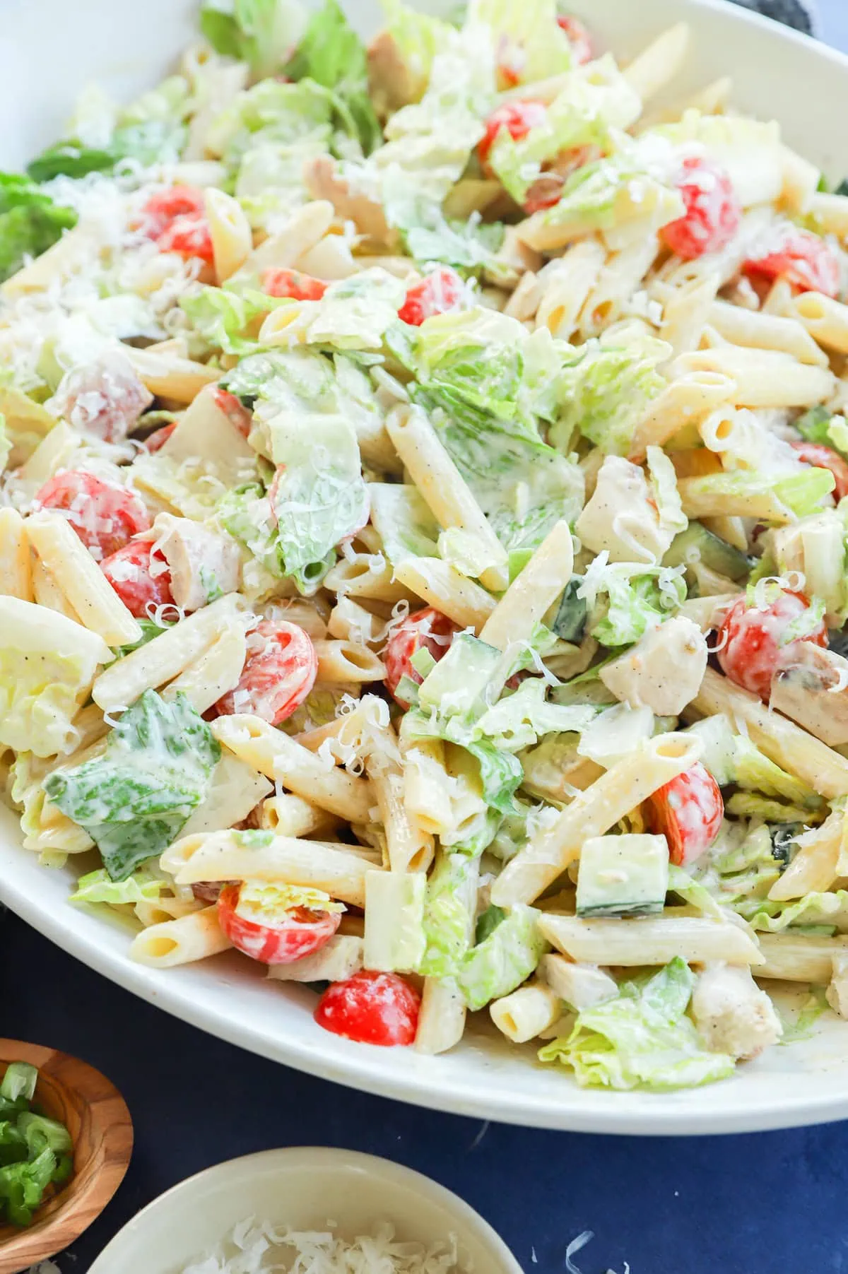 chicken caesar pasta salad in a large bowl