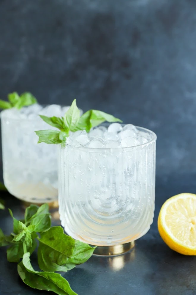 fresh herb cocktail with gin lemon and fresh herbs