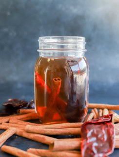 infusing bourbon with warming spices and chile