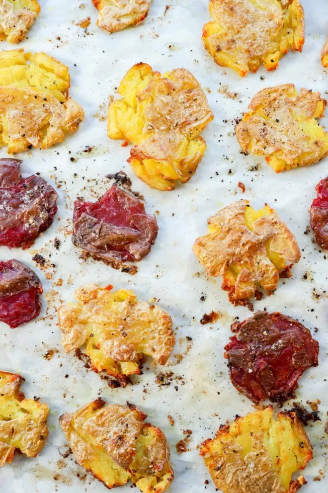 smashed potatoes on a baking sheet after baking