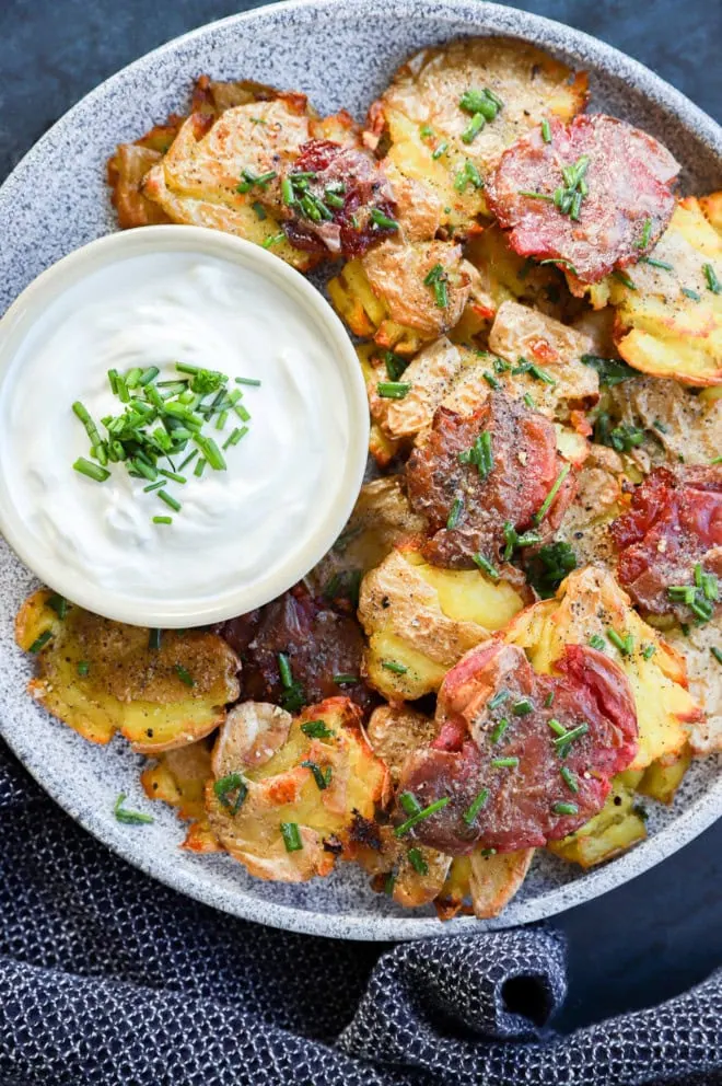 easy spud side side or appetizer on platter with sour cream