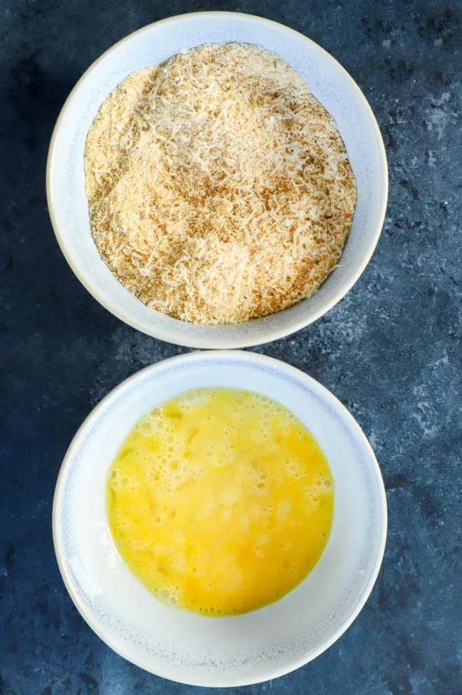 bread crumbs and eggs in bowls for dredging