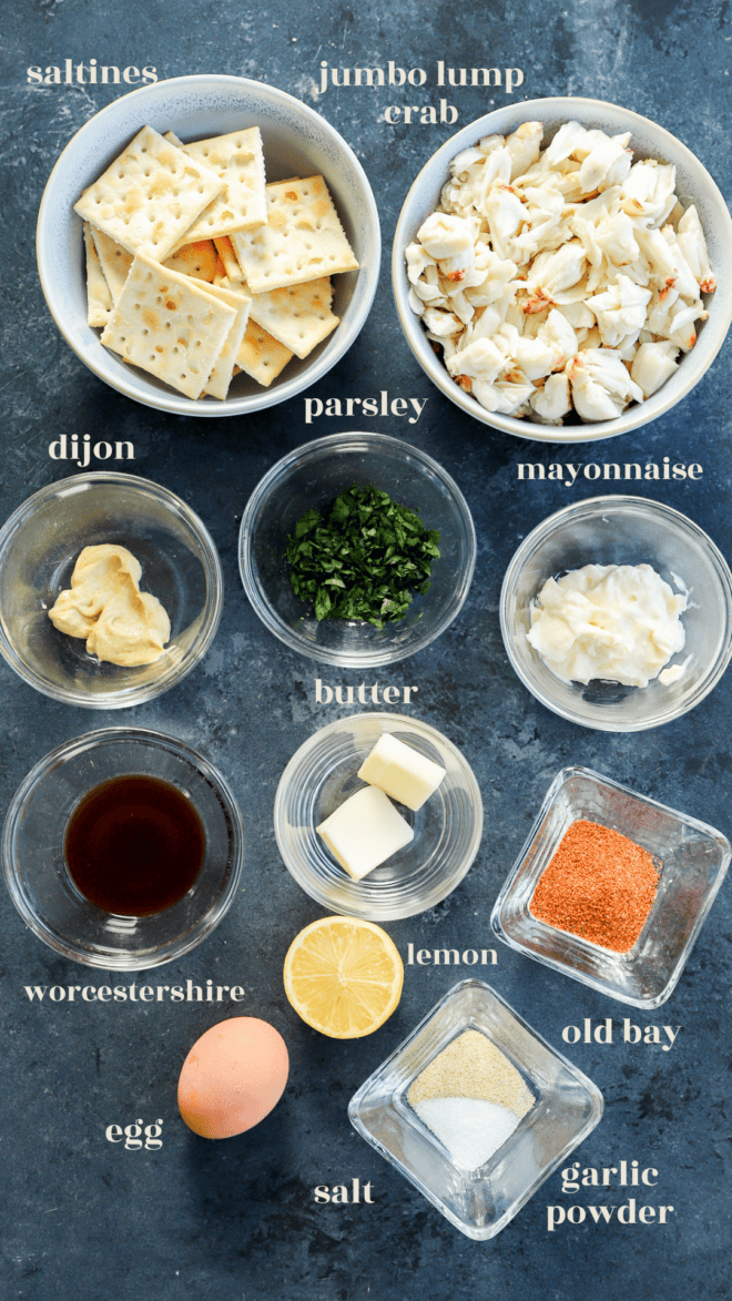 ingredients for baked crab cakes in bowls with text labels