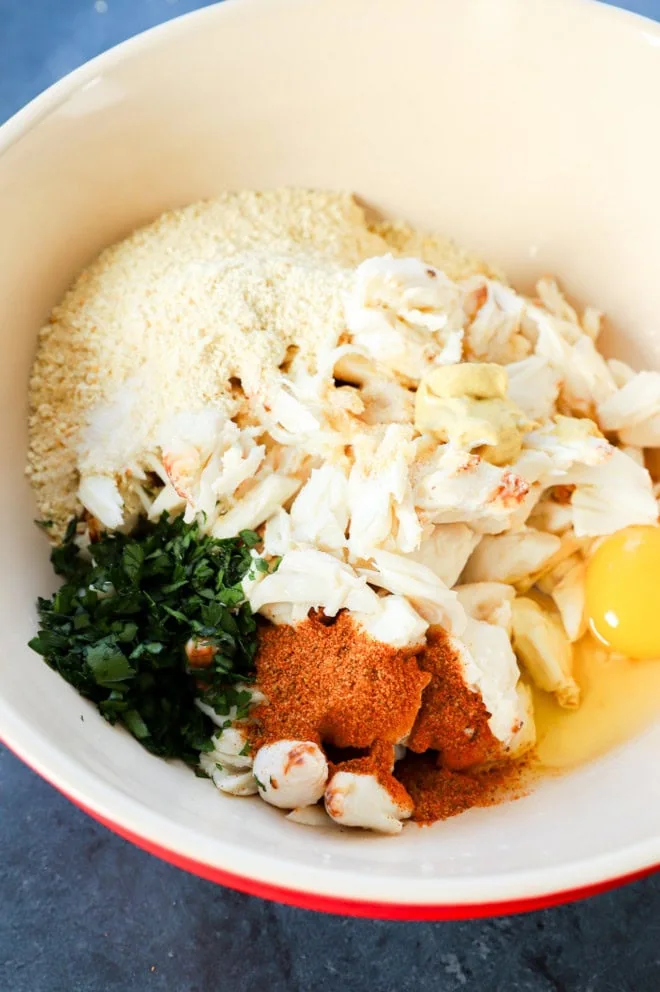 maryland crab cake mixture in bowl before stirring