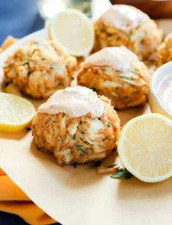 fresh seafood appetizer after baking with lemons and sauce