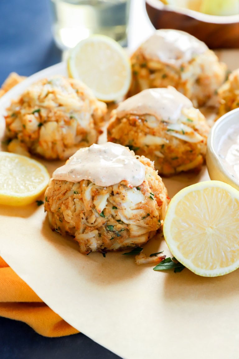 fresh seafood appetizer after baking with lemons and sauce