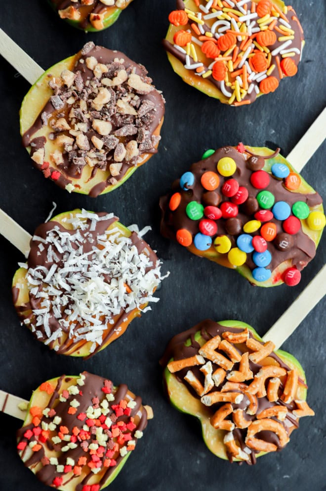 candy apple slices on a slate platter