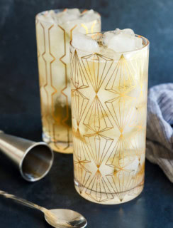 glasses of Japanese highball cocktail with cocktail spoon and jigger