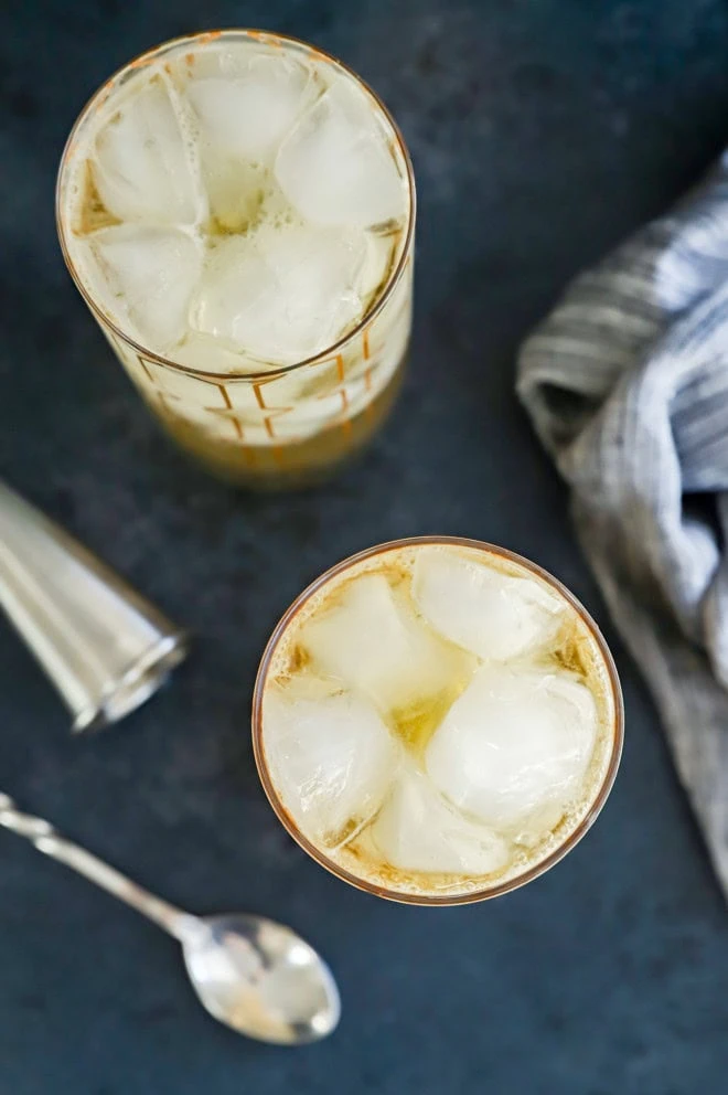 Overhead view of whisky cocktails with bubbly soda water