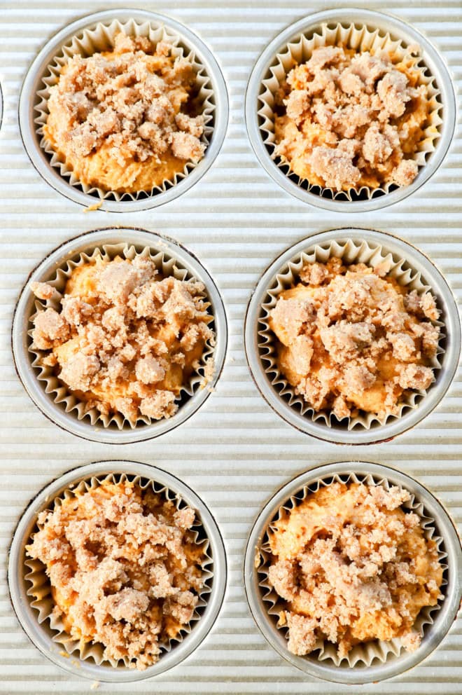 pumpkin banana muffins in muffin tin before baking