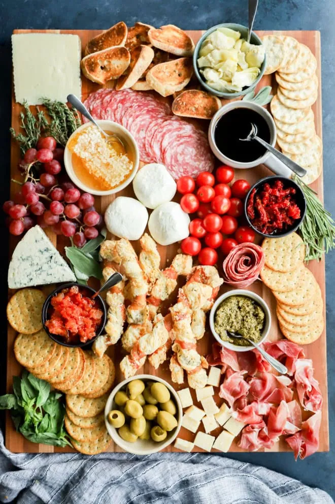 full italian charcuterie board with meats cheeses and extras