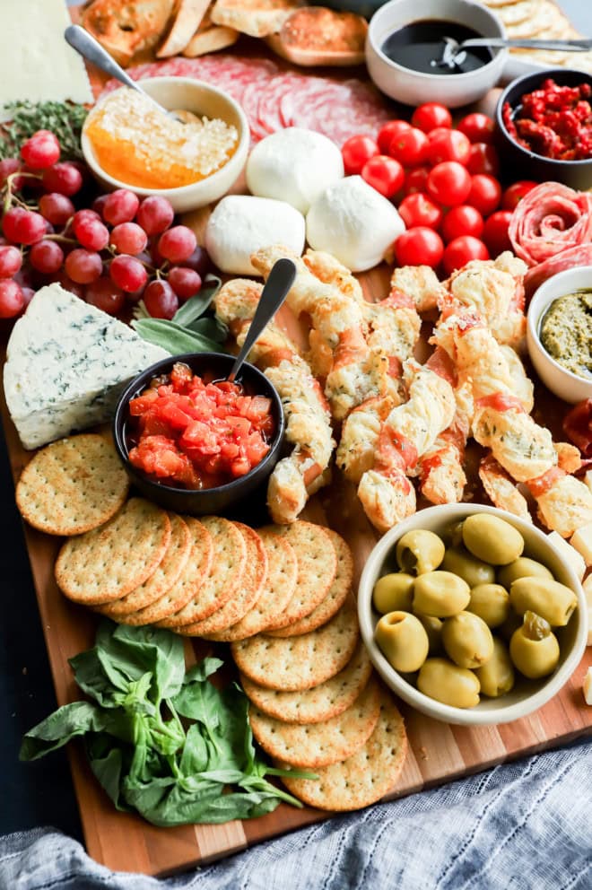 lots of ingredients for a meat and cheese board from italy