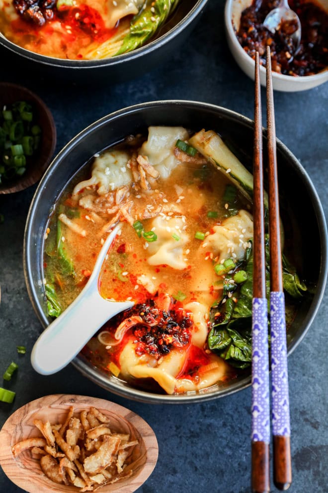 spoon in bowl with asian inspired broth