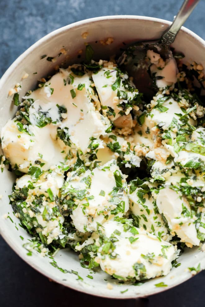 garlic herb butter being made in a bowl