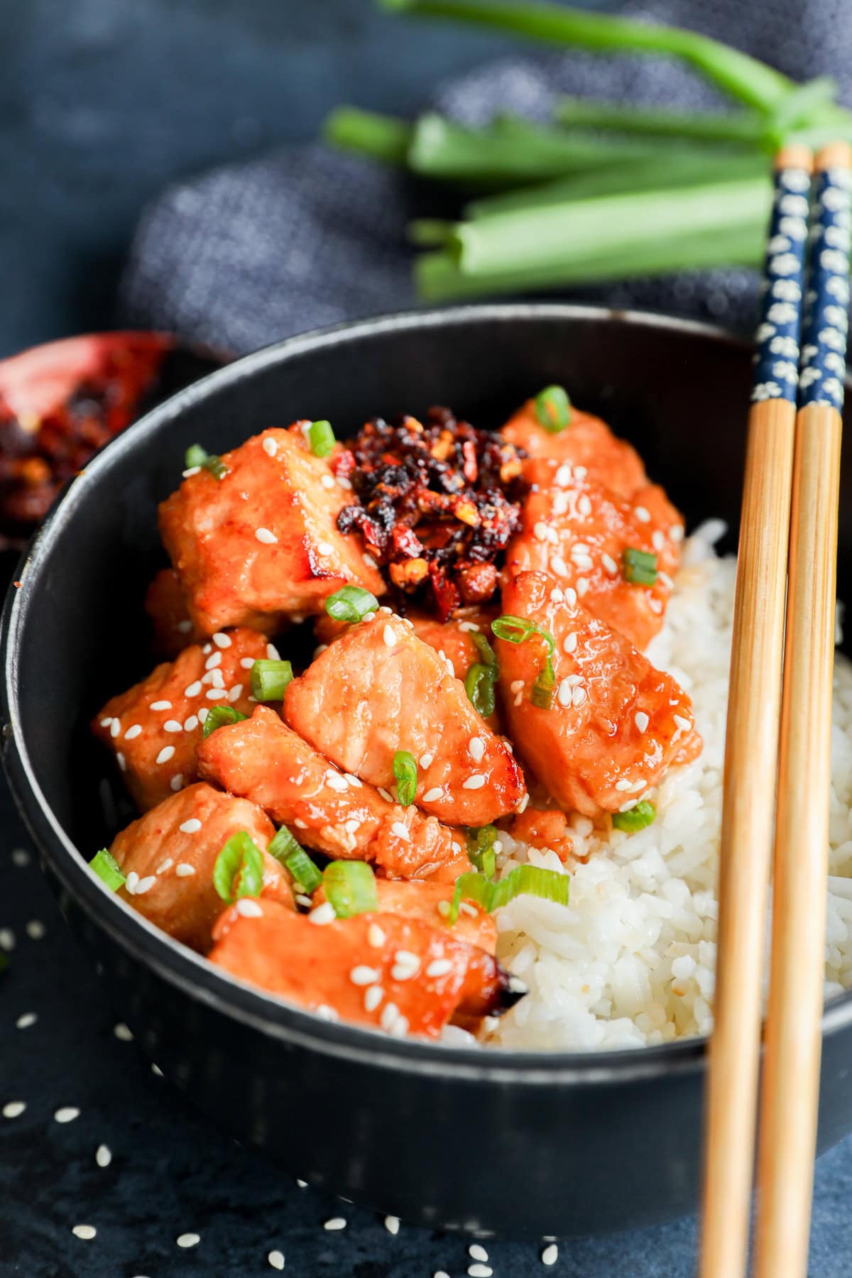 bowl of salmon bites glazed with honey sesame ginger marinade