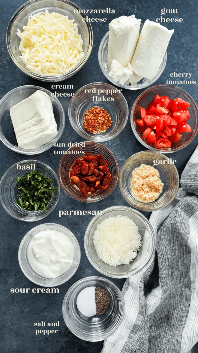 baked goat cheese appetizer dip ingredients in bowls with text labels