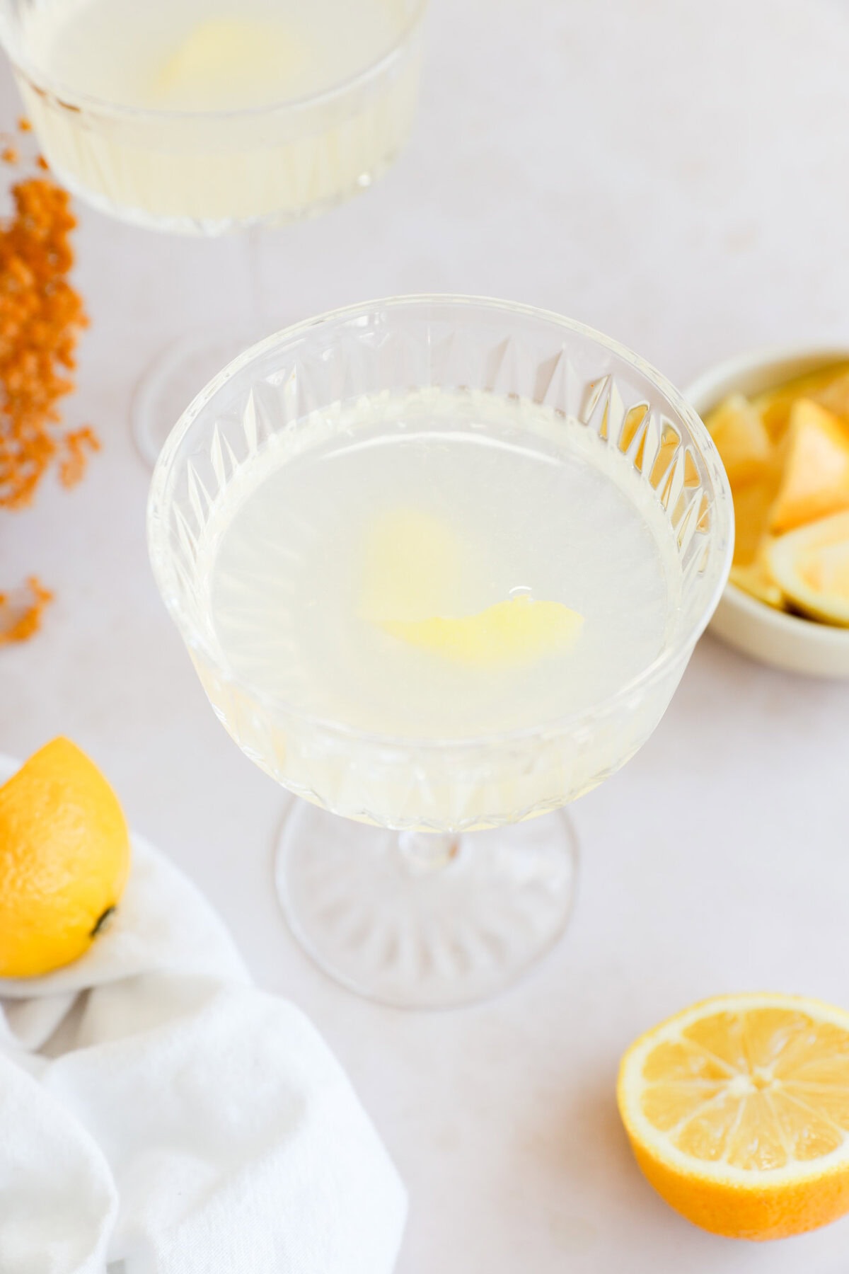 easy lemony cocktail with lemon twist