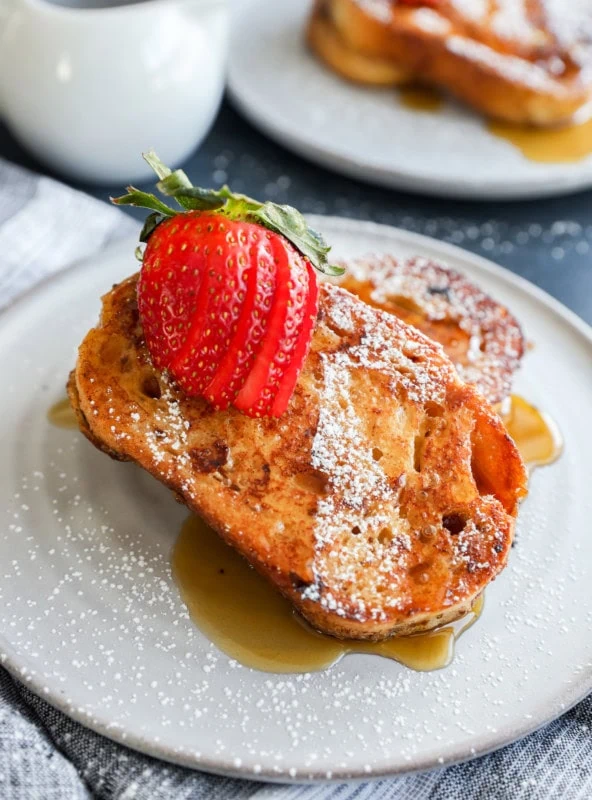 easy breakfast on a plate with maple syrup and fresh fruit